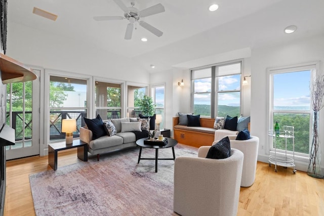 3800 Laurel Ledge Ln, Austin, TX 78731 - living room featuring light wood-type flooring, recessed lighting, a ceiling fan, and vaulted ceiling