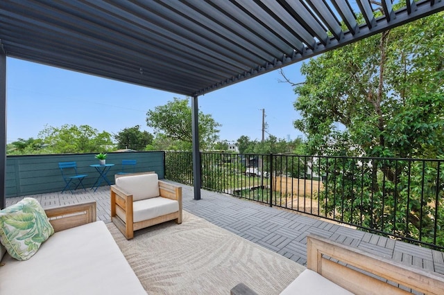 view of patio featuring a balcony