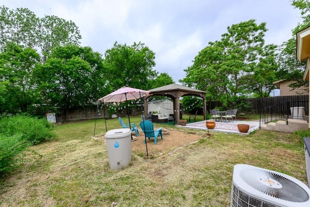 7103 Howerington Cir, Austin, TX 78724 - view of yard with a gazebo, central air condition unit, and a patio