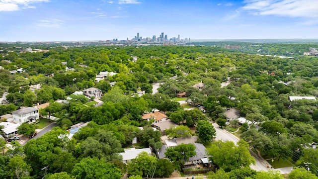 birds eye view of property with a city view