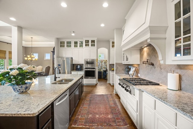 103 Maddy Way, Austin, TX 78738 - kitchen with stainless steel appliances, healthy amount of natural light, white cabinetry, and recessed lighting