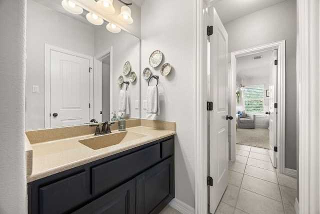 103 Maddy Way, Austin, TX 78738 - bathroom with vanity and tile patterned flooring