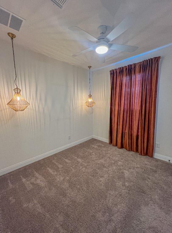 512 Barbary Coast Ln, Jarrell, TX 76537 - empty room featuring carpet flooring, ceiling fan, and baseboards