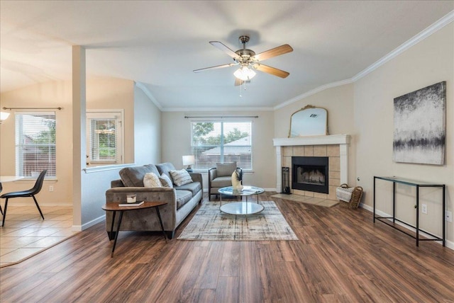 118 San Gabriel Dr, Kyle, TX 78640 - living area with baseboards, ceiling fan, crown molding, and wood finished floors