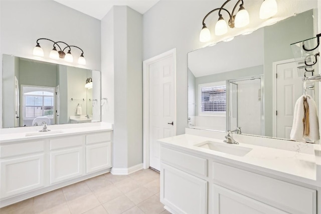 full bathroom with vanity, baseboards, connected bathroom, tile patterned floors, and a stall shower