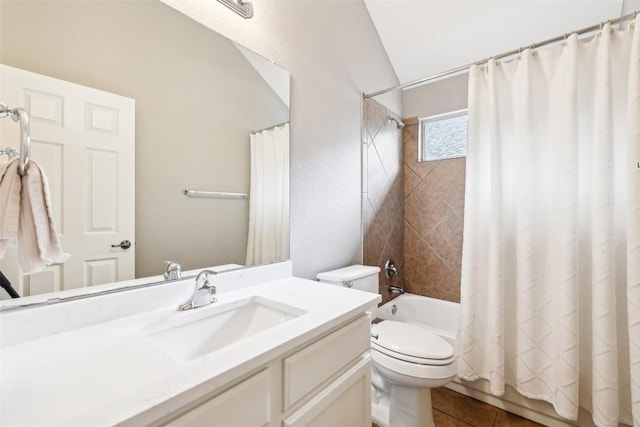 full bathroom featuring shower / tub combo, vanity, toilet, and lofted ceiling