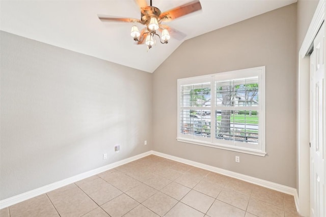 330 Wildhorse Crk, Buda, TX 78610 - unfurnished room with a ceiling fan, baseboards, vaulted ceiling, and light tile patterned flooring