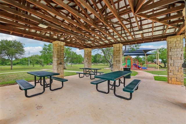 view of community featuring a lawn and playground community