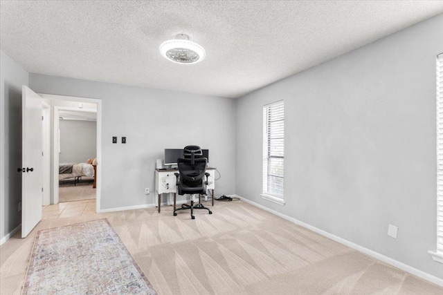 3910 Wendy Oaks Dr, Temple, TX 76502 - carpeted home office with a textured ceiling and baseboards
