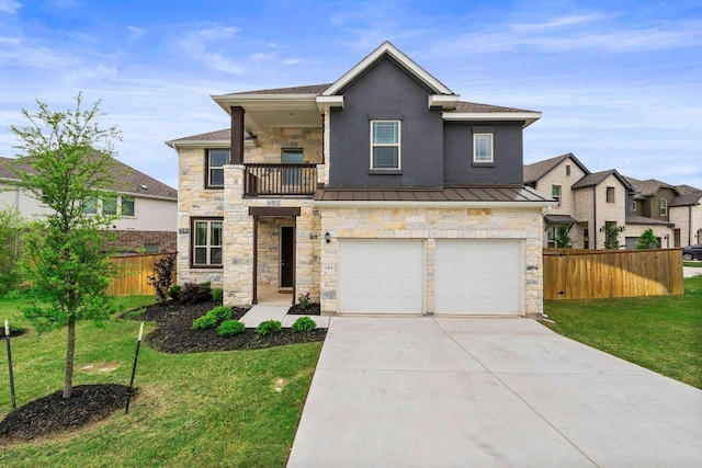 1312 Ridge Runner Dr, Georgetown, TX 78628 - view of front facade with a balcony, stone siding, driveway, a standing seam roof, and an attached garage