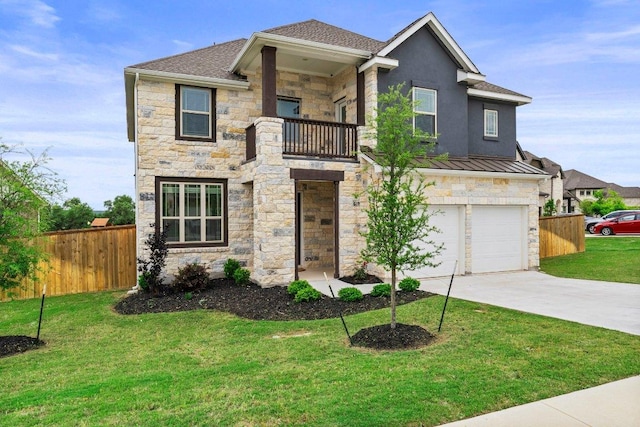 view of front facade with a garage, fence, a balcony, concrete driveway, and stone siding