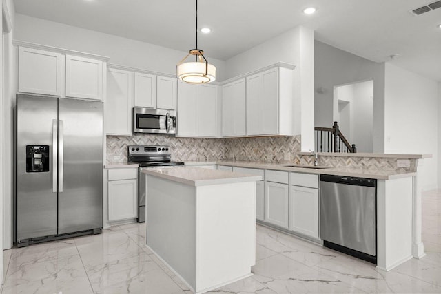 kitchen featuring visible vents, appliances with stainless steel finishes, a sink, marble finish floor, and recessed lighting