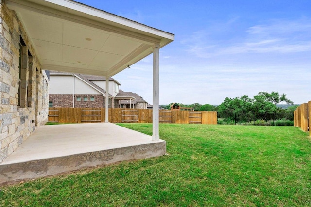 view of yard featuring a fenced backyard and a patio area