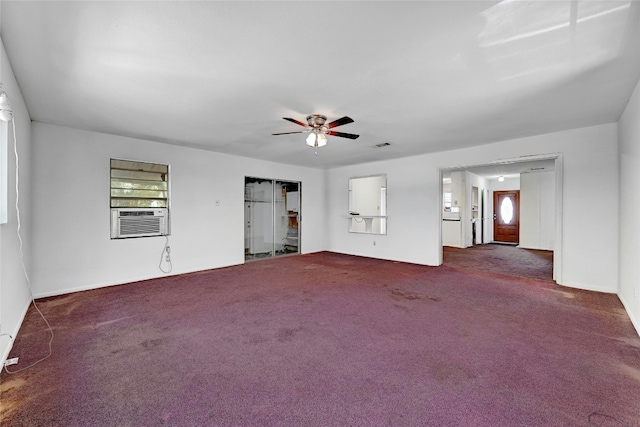 unfurnished living room featuring visible vents, carpet, ceiling fan, and cooling unit