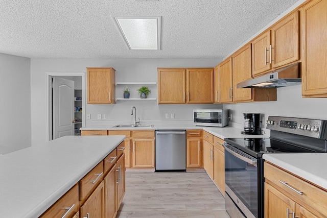 4325 Dos Cabezas Dr, Austin, TX 78749 - kitchen featuring appliances with stainless steel finishes, a sink, under cabinet range hood, open shelves, and a textured ceiling