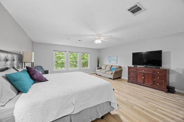 4325 Dos Cabezas Dr, Austin, TX 78749 - bedroom with light wood-type flooring, baseboards, and a ceiling fan