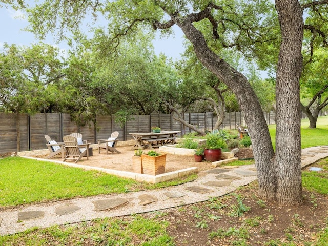 view of yard featuring a fenced backyard and a patio area