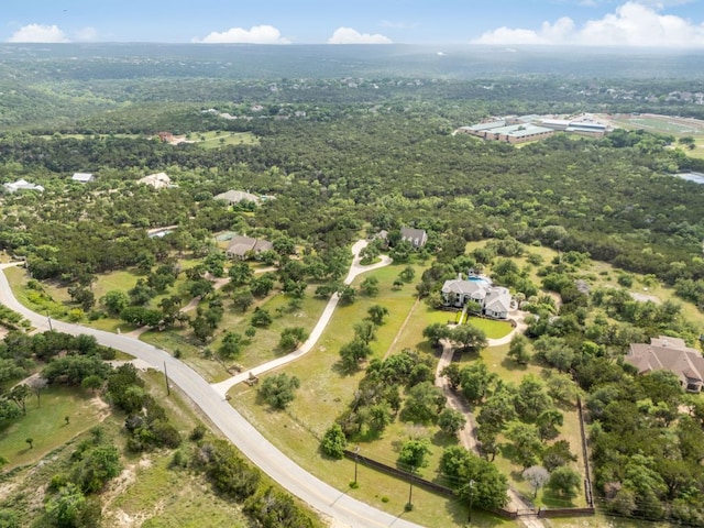 aerial view featuring a view of trees