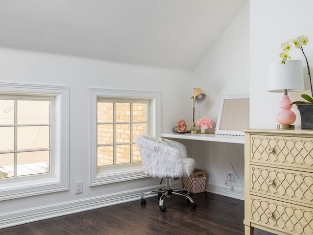office featuring baseboards, wood finished floors, and lofted ceiling