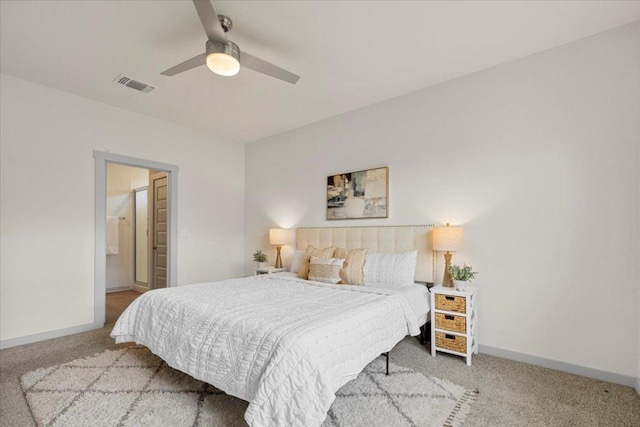 bedroom featuring carpet flooring, baseboards, visible vents, and ceiling fan