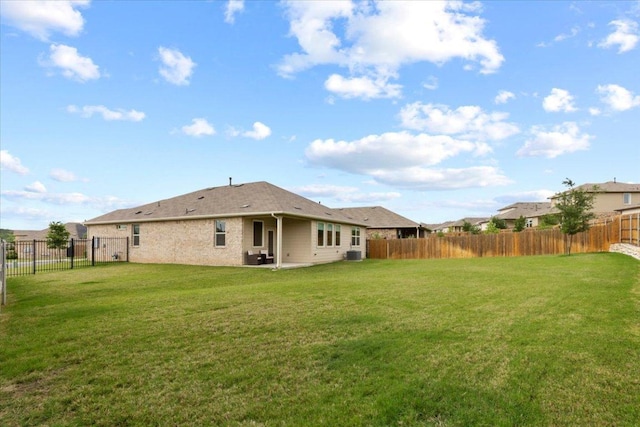 view of yard with a fenced backyard and a patio area