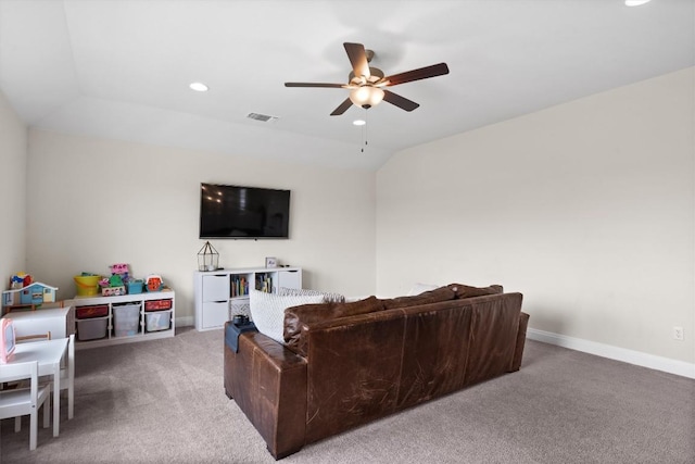 carpeted living area featuring a ceiling fan, baseboards, visible vents, and recessed lighting