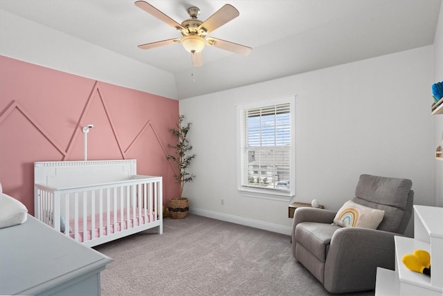 17111 Calipatria Ln, Pflugerville, TX 78660 - bedroom with a crib, carpet, baseboards, and a ceiling fan