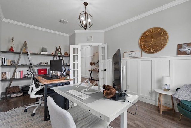 17111 Calipatria Ln, Pflugerville, TX 78660 - office space with wood finished floors, ornamental molding, french doors, a chandelier, and wainscoting