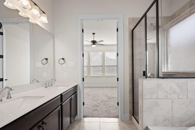 full bathroom featuring a sink, a ceiling fan, and a stall shower