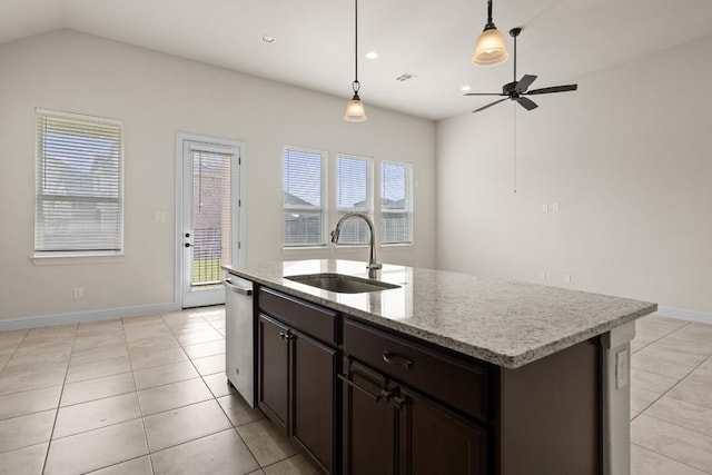 kitchen with light tile patterned flooring, ceiling fan, a sink, dishwasher, and decorative light fixtures
