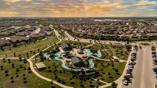 aerial view at dusk with a residential view