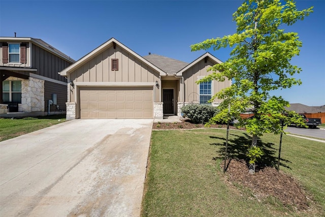 view of front of property with a garage, board and batten siding, driveway, and stone siding