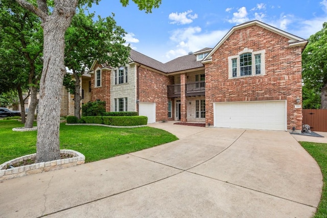 715 Nelson Ranch Rd, Cedar Park, TX 78613 - traditional-style home with a front yard, a garage, brick siding, a balcony, and concrete driveway