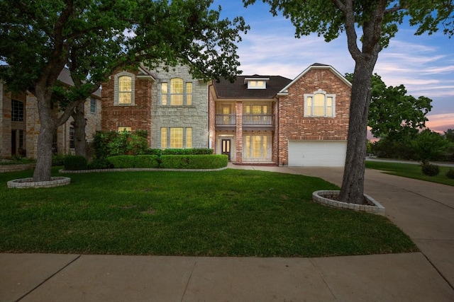 715 Nelson Ranch Rd, Cedar Park, TX 78613 - traditional-style home with driveway, a garage, brick siding, a balcony, and a yard