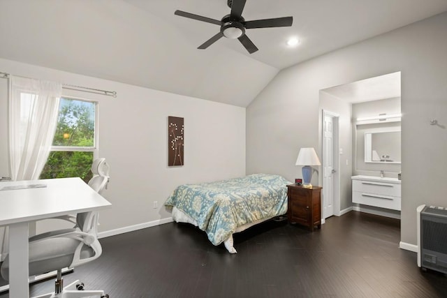 715 Nelson Ranch Rd, Cedar Park, TX 78613 - bedroom with baseboards, vaulted ceiling, heating unit, and dark wood-type flooring