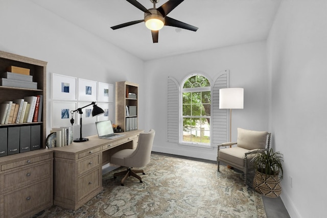 home office featuring ceiling fan and baseboards