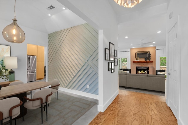 111 Crest View Dr, Lakeway, TX 78734 - hall featuring recessed lighting, baseboards, light wood-type flooring, and an accent wall