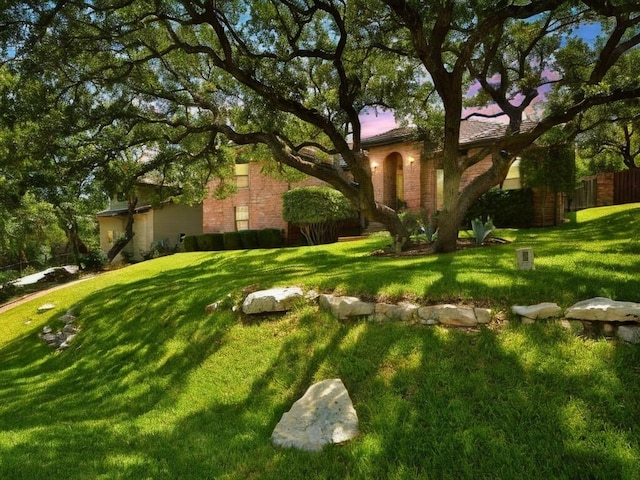 111 Crest View Dr, Lakeway, TX 78734 - obstructed view of property with brick siding
