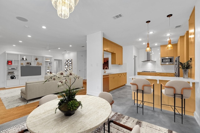 111 Crest View Dr, Lakeway, TX 78734 - dining room featuring recessed lighting and a chandelier