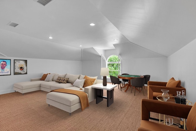 living area featuring visible vents, recessed lighting, vaulted ceiling, and light carpet