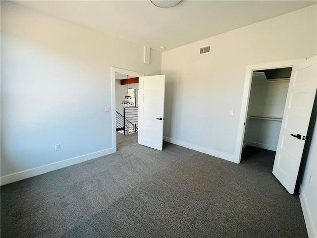 6308 Hudson Bend Rd, Austin, TX 78734 - unfurnished bedroom featuring dark carpet and baseboards