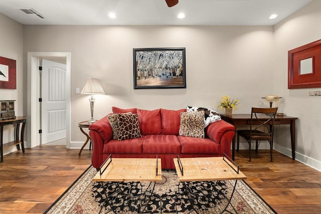 living area with ceiling fan, recessed lighting, baseboards, wood finished floors, and visible vents