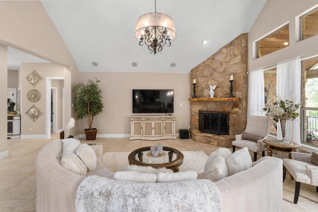 living area with high vaulted ceiling, a chandelier, a stone fireplace, and light tile patterned floors