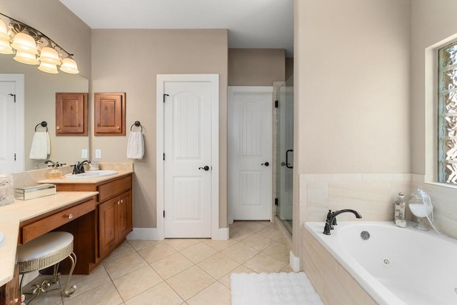 full bath featuring vanity, tile patterned floors, a shower stall, and a tub with jets