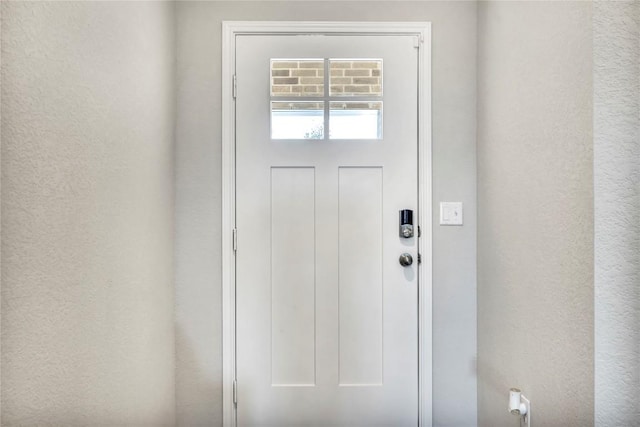 doorway with a textured wall