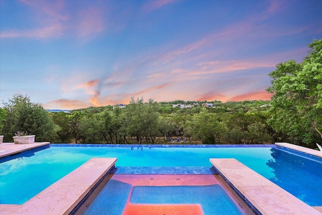 277 S Commons Ford Rd, Austin, TX 78733 - view of pool featuring an infinity pool