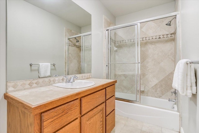 277 S Commons Ford Rd, Austin, TX 78733 - full bathroom with vanity, combined bath / shower with glass door, and tile patterned floors