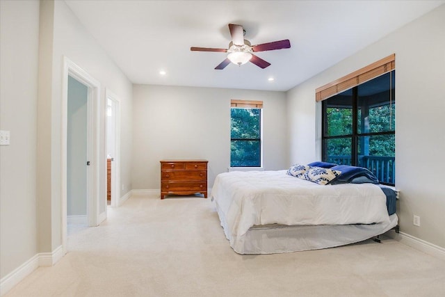carpeted bedroom with baseboards, ceiling fan, and recessed lighting