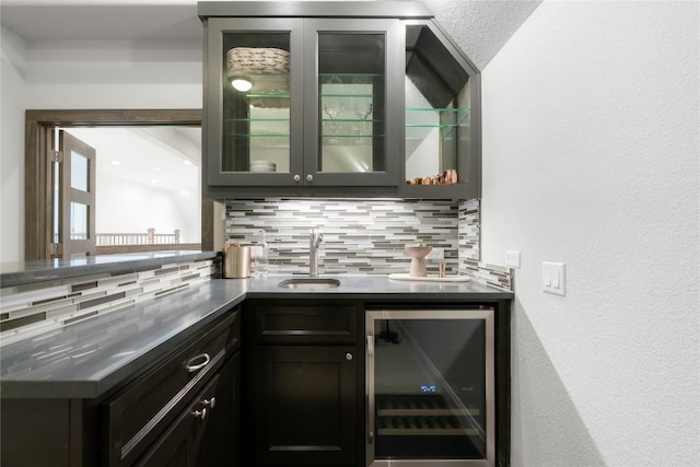 2033 Portobello Rd, Leander, TX 78641 - indoor wet bar with beverage cooler, backsplash, and a textured wall