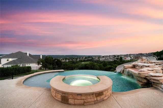 2033 Portobello Rd, Leander, TX 78641 - view of swimming pool with a pool with connected hot tub
